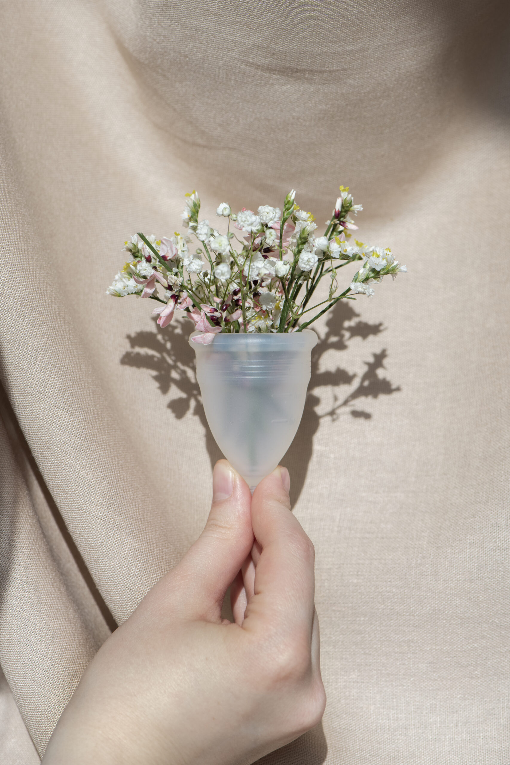 reusable-menstrual-cup-product-with-flowers